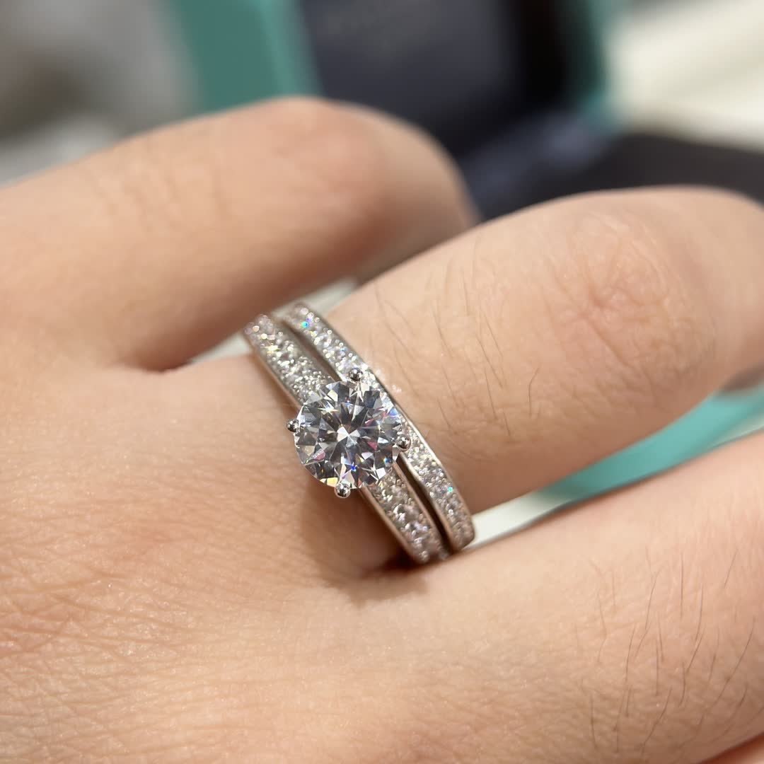 Tiffany & Co. Solitaire Ring with Diamond Band